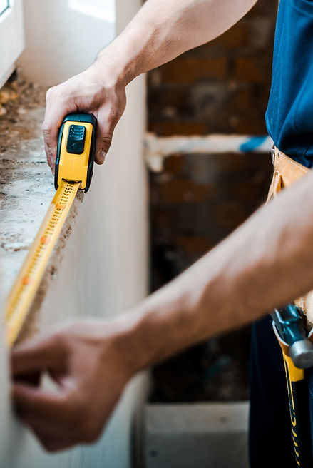 Handyman with Measuring Tape